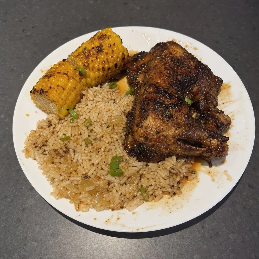 Cuisses de poulet rôties à la jamaïcaine, riz aux oignons et maïs grillé