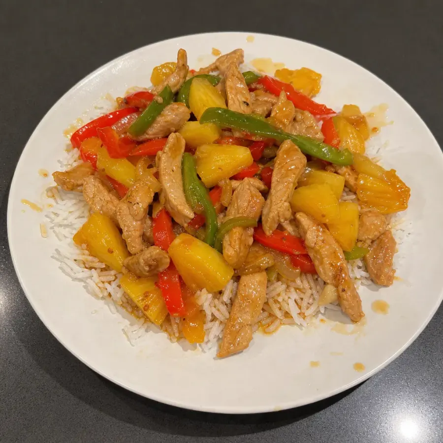 Sauté de porc aigre-doux aux poivrons, ananas et riz basmati